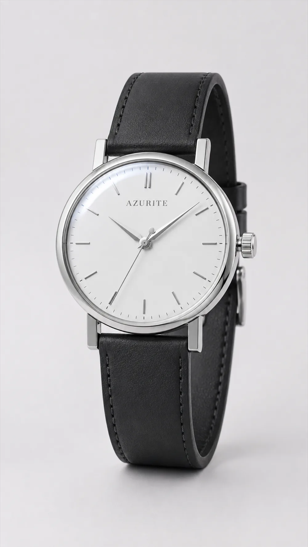 AZURITE Alba: matte white lacquer dial, polished steel case, black calf strap, standing upright on a pale ground